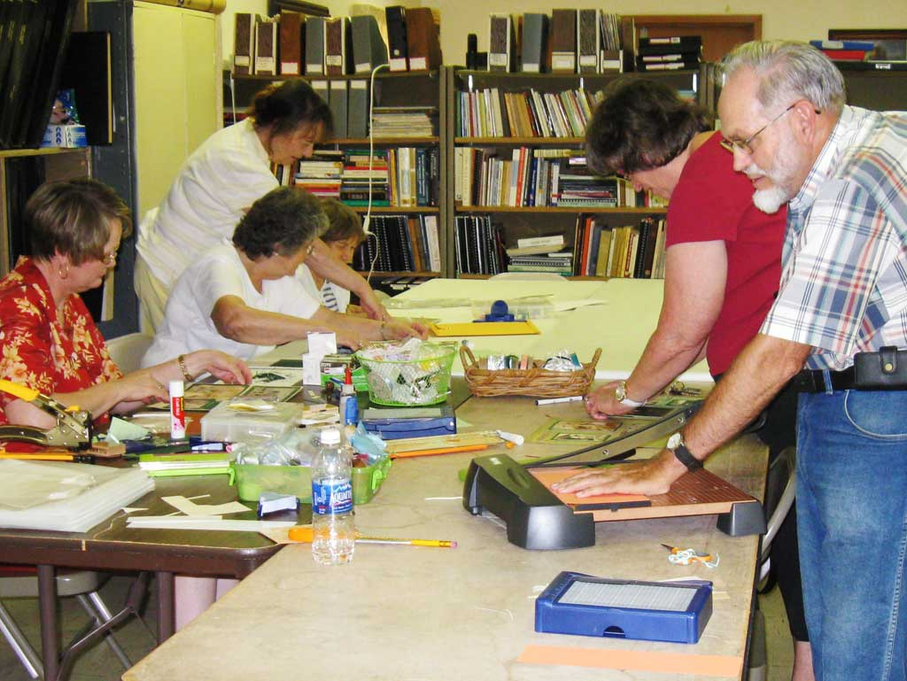 Workshop participants work on scrapbooking